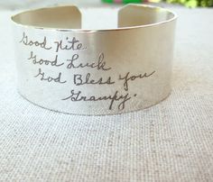 A wide sterling silver bracelet with ACTUAL handwriting engraved onto it! Each bracelet is 1 inch wide by 6 inches long and made of sterling silver. We currently offer our cuffs in 3 widths, the 1 inch is offered in this listing but we also have: 5mm: https://www.etsy.com/listing/199964447/thin-silver-cuff-bracelet-actual  8mm: https://www.etsy.com/listing/267703135/silver-cuff-bracelet-actual-handwriting  {ordering info}  Once you have checked out, please follow the instructions shown in the... Personalized Silver Cuff Bracelet, Birthstone Stacking Rings, Slide Bracelet, Family Jewellery, Stacked Jewelry