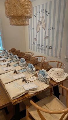 the table is set up with place settings for guests to sit down and enjoy their meal