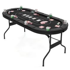 a black table topped with lots of poker chips