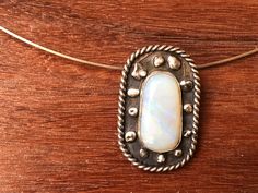 A solid white Australian opal with blue lilac colour showing through bezel set on terling silver embellished with wire rope and fine silver nuggets. Lilac Colour, Blue Lilac, Jewelry Accessories Ideas, Accessories Ideas, Lilac Color, Australian Opal, White Opal, Sterling Silver Pendant, Fine Silver