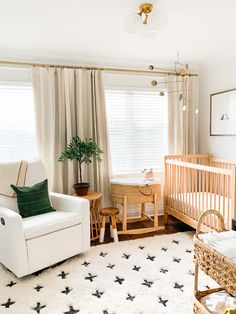 a baby's room is decorated in neutral colors