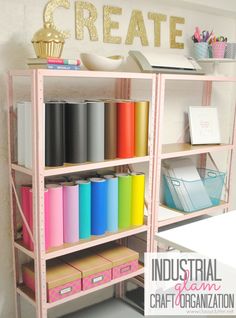 a shelf filled with lots of crafting supplies next to a sign that says create