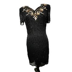 "This is a Vintage Black Sequin Beaded Silk Cocktail Dress in a Sz Medium Petite by Silky Nites New York with Gold sequins at the neckline and Short Sleeves. - Zips in back - Beaded VNeck - Original Shoulder Pads Still Attached - Knee Length - Silky Under Lining It is in excellent condition with no rips, stains, tears, or holes Appx Measurements: (Based on Flat Lay) Armpit to Armpit: 19\" Bust: 38\" Waist: 32 \" Hips: 40\" Shoulder to Bottom Hem: 37\" Sleeve Length: 8\" Material: 100% Silk Outer Cocktail Vintage, Silk Cocktail Dress, Gold Shorts, Vintage Cocktail, Gold Sequins, Sequin Beading, Black Sequins, Dress Clothes For Women, Vintage Black