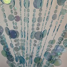 PRICES MAY VARY. LIGHTWEIGHT and STURDY : This circular flat discs door curtain is made out of high-quality acrylic beads and features 23 strands which are about 1 Inch 1/4 apart, All strands are hanging from one rod. VERSATILE : This beads curtain door can be used over an existing door or a window, as a closet curtain, room divider, for weddings and events, or in retail locations as a cool window display. Use for just about any door way – use your imagination! EASY INSTALLATION : Each beaded cu Door Beads Aesthetic, Mermaid Inspired Room, Aesthetic Room Curtains, Sea Themed Room Aesthetic, Ocean Themed Bedroom For Kids, Ocean Themed Room Decor, Ocean Themed Decor, Ocean Themed House, Oceancore Room