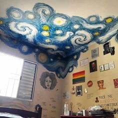 the ceiling in this bedroom is painted with blue and white swirls, which look like clouds