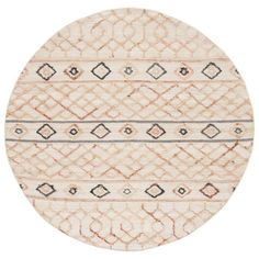 a round rug with an intricate design on the inside and outside, in beige tones