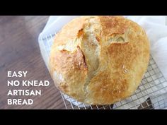 a loaf of bread sitting on top of a cooling rack