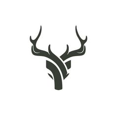 an antelope's head with horns is shown in this black and white logo