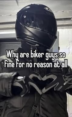 a person wearing a motorcycle helmet and gloves with the words why are biker guys so fine for