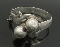 "MORENA MEXICO 925 Silver - Vintage Shiny Modernist Bangle Bracelet - BT8948  Jewelry Type:         Bracelet   Metal Type:            925 Silver  Metal Size:             6.5\" Length  1\" Height   Stone Type:            N/A  Condition:              N/A  Jewelry Weight:     46.6 Grams  PLEASE NOTE: THIS ITEM IS PRE-OWNED. ALTHOUGH MOST ITEMS ARE IN VERY GOOD CONDITION, SOME MAY NEED CLEANING AND/OR MINOR REPAIRS. WE MAKE A VERY STRONG EFFORT TO UPLOAD CLEAR PICTURES. PLEASE INSPECT ALL PICTURES AND ASK ALL QUESTIONS YOU MAY HAVE PRIOR TO MAKING A PURCHASE. NOT ALL STONES ARE GENUINE, SOME ARE ENHANCED OR CREATED." Silver Jews, Metal Bra, Avant Garde Jewelry, Stag Beetle, Clear Pictures, Bracelet Metal, Modernist Jewelry, Silver Bells, Funky Jewelry