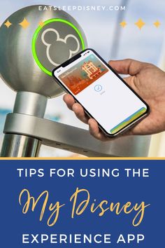 someone using their phone to check out the disney experience at walt world with text overlay that reads tips for using the my disney experience app