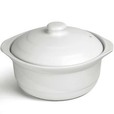 a white casserole dish with a lid