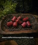 there are some strawberries in a bowl on the table