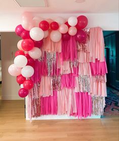 DIY Pink photo backdrop with frine and half balloon garland, made with multi purpose net and plastic table cloths Table Cloth Party Backdrop, Hot Pink Backdrop Ideas, 21 Birthday Photo Backdrop, Diy Bachelorette Photo Backdrop, Diy Pink Photo Backdrop, Table Cloth Garland Backdrop, 21st Bday Balloon Ideas, Cute Photo Backdrops Diy, Pink Photoshoot Backdrop