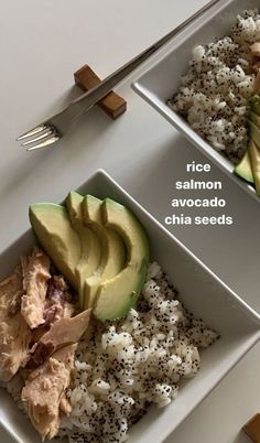 two white plates filled with rice, avocado and tuna