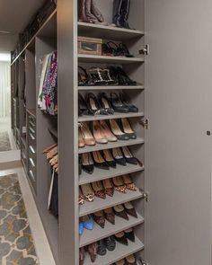 the closet is full of shoes and purses for all kinds of people to use