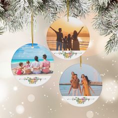 three ornaments hanging from a christmas tree decorated with family photos