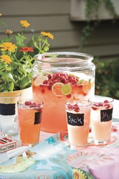 there is a jar with drinks on the table