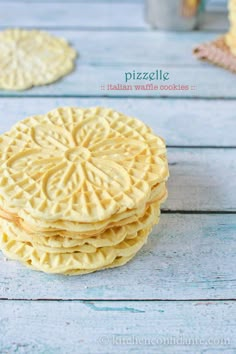 four small waffle cookies stacked on top of each other