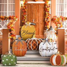 pumpkins and gourds are sitting on the front porch