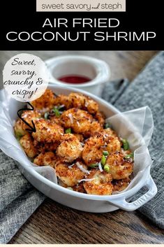 a white bowl filled with fried coconut shrimp