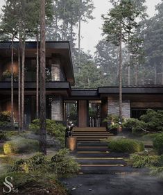 a house in the woods with stairs leading up to it's entrance and trees