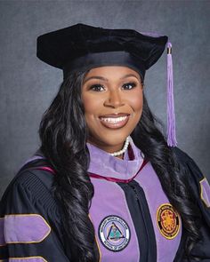 a woman wearing a graduation cap and gown