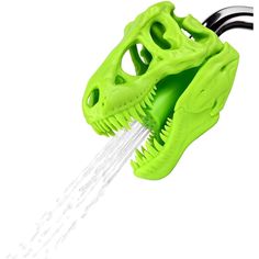 a green dinosaur toothbrush holder with water coming out of it's mouth and teeth