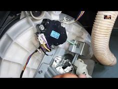 an image of the inside of a car's air conditioner with wires attached to it