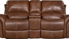 the reclining loveseat has two seats and is made out of brown leather