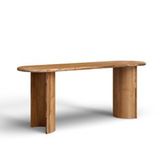 a wooden table sitting on top of a white floor