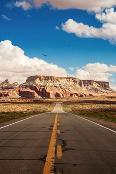 an empty road in the middle of nowhere