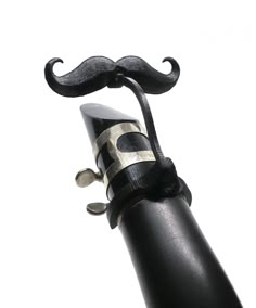 a black handlebar with a moustache on it's top and bottom part