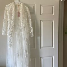 Long Sleeve Wedding Cape, Elegant Lace, Tulle Cape Veil, Bridal Cape, Bridal Robe, Sheer Cover-Up,Detachable Train Made By Italian Designer Rosalia Di Venezia Brand New. Perfect Condition. Tag Attached. Color: Ivory Small Size. Size 4 Lace Mother Of The Bride Dress With Intricate Embroidery, Cape Veil, White Poncho, Tulle Cape, Cowl Neck Poncho, Kimono Style Jacket, Sheer Cover Up, Detachable Train, Sheer Kimono