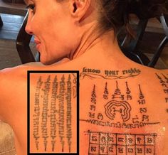 the back of a woman's neck with some writing on it and an image of a