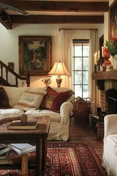 a living room filled with furniture and a fire place