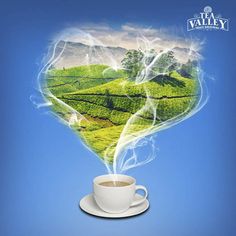 a coffee cup with steam rising out of it's head in the shape of a tea plantation