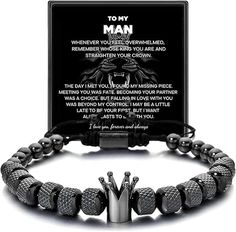 a black bracelet with silver beads and an image of the words to my man on it