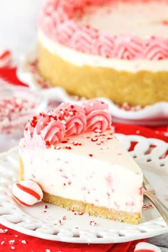 a slice of peppermint ice cream pie on a white plate with candy canes