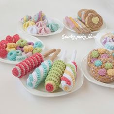 crocheted food items displayed on white plates