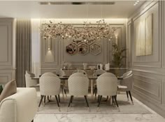 an elegant dining room with chandelier and white chairs