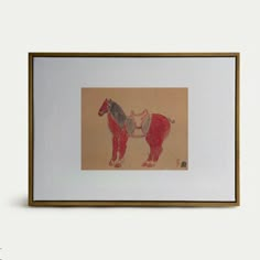 a drawing of a horse is hanging on the wall next to a white frame with a brown border