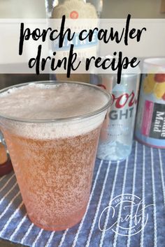 a drink in a glass sitting on top of a table