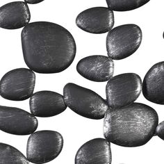 black and white photograph of pebbles in water