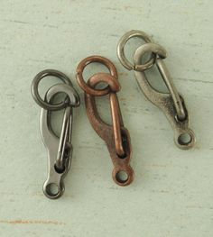 three different types of scissors on a table