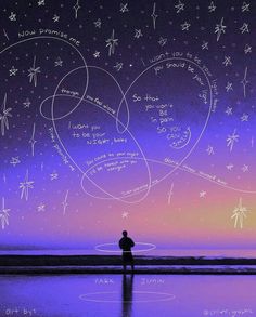 a man standing on top of a beach next to the ocean under a sky filled with stars