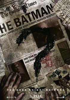 the batman movie poster with hands on newspaper