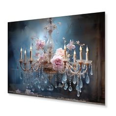 a chandelier with flowers and candles hanging from it