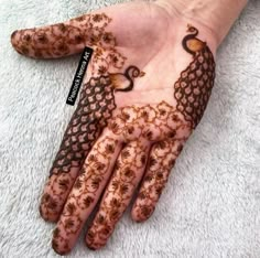 a person's hand with hennap on it