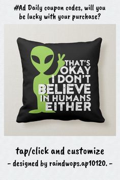 a pillow with an alien saying on it